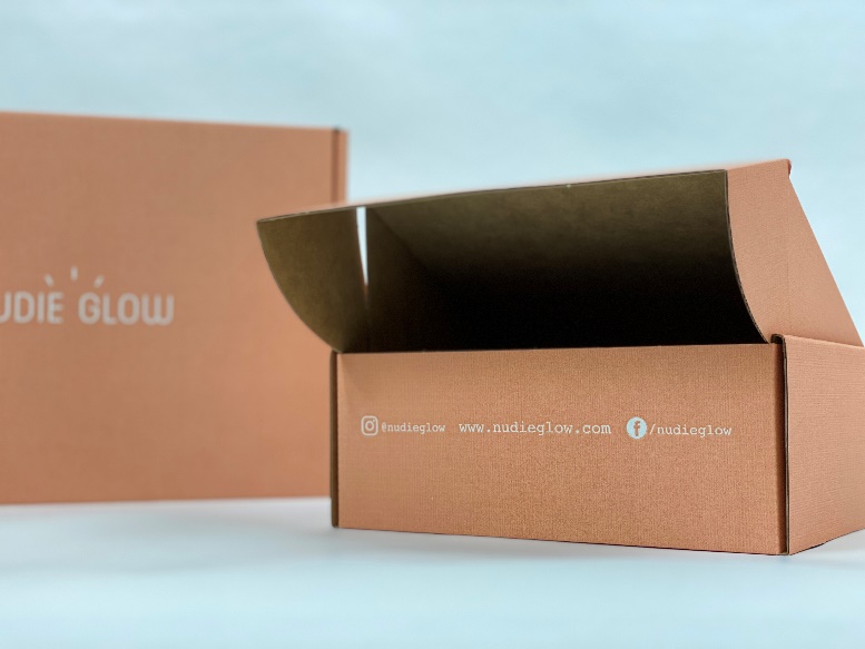 Custom-printed packaging allowed Nudie Glow to feature their social media handles, encouraging online engagement with their customers and providing an enhanced unboxing experience.